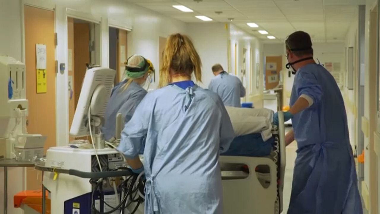 Health care workers appear in a hospital in this file image. (AP)