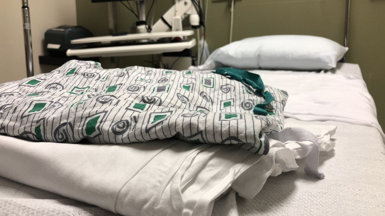 Hospital bed and clothes. (Spectrum News 1/FILE)