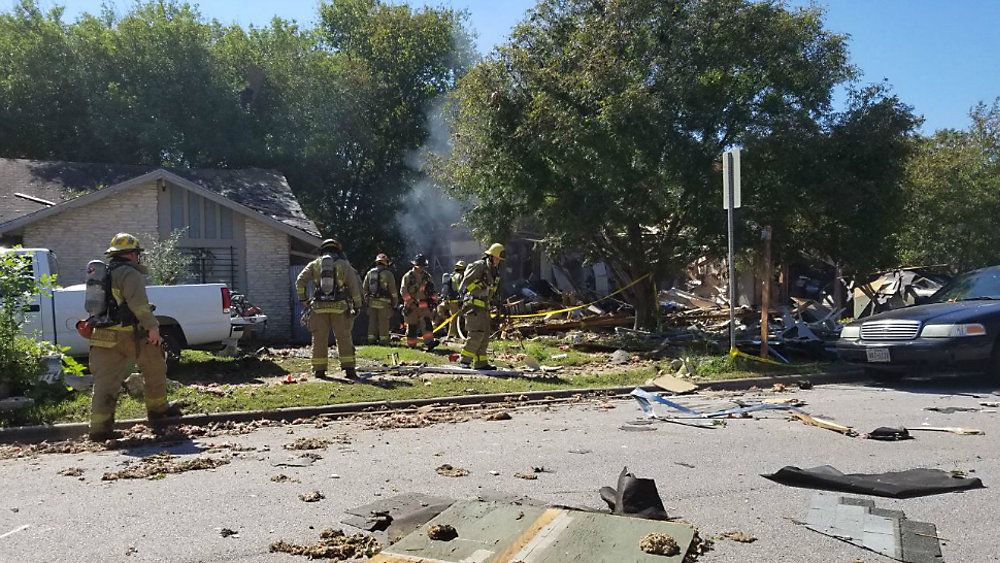 Firefighters at the scene of a home explosion in Southeast Austin (Photo Credit: @AustinFireInfo)