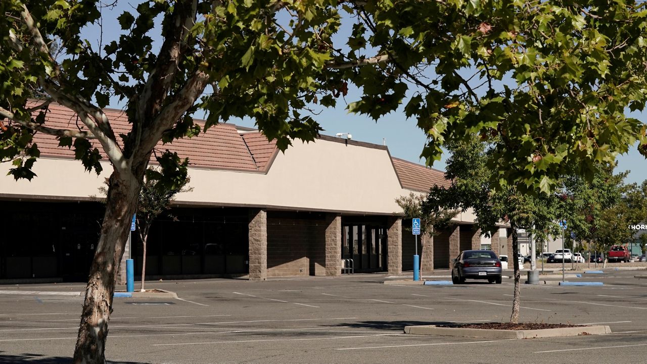 A commercial building sits empty in Sacramento, Calif., Thursday, Sept. 22, 2022. (AP Photo/Rich Pedroncelli)