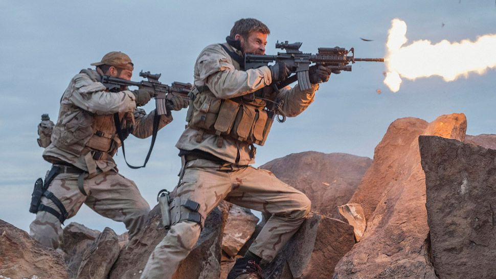 (L-R) GEOFF STULTS as Sean Coffers and CHRIS HEMSWORTH as Captain Mitch Nelson in Alcon Entertainment's, Black Label Media's and Jerry Bruckheimer Films' war drama "12 STRONG," a Warner Bros. Pictures release.