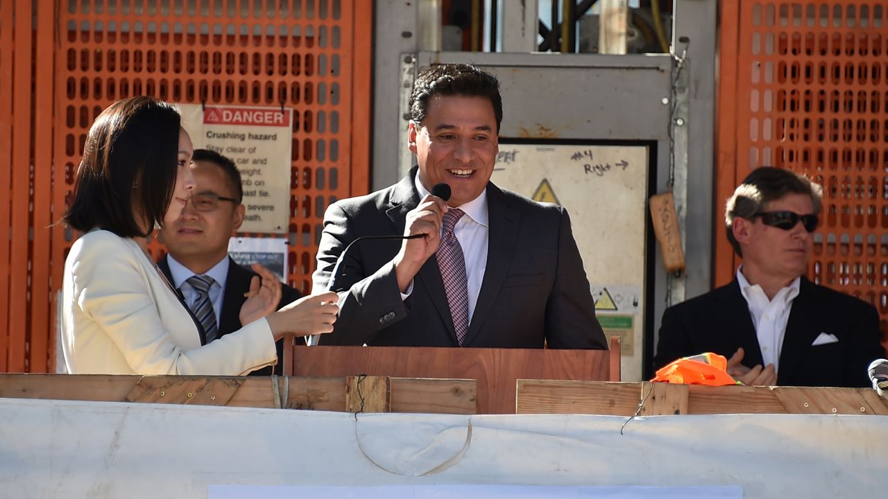 Councilmember Jose Huizar addresses attendees at Greenland’s Top-off of Tower I at Metropolis Tuesday, Dec. 8, 2015, in Los Angeles. (Photo by Jordan Strauss/Invision for Greenland USA/AP Images)