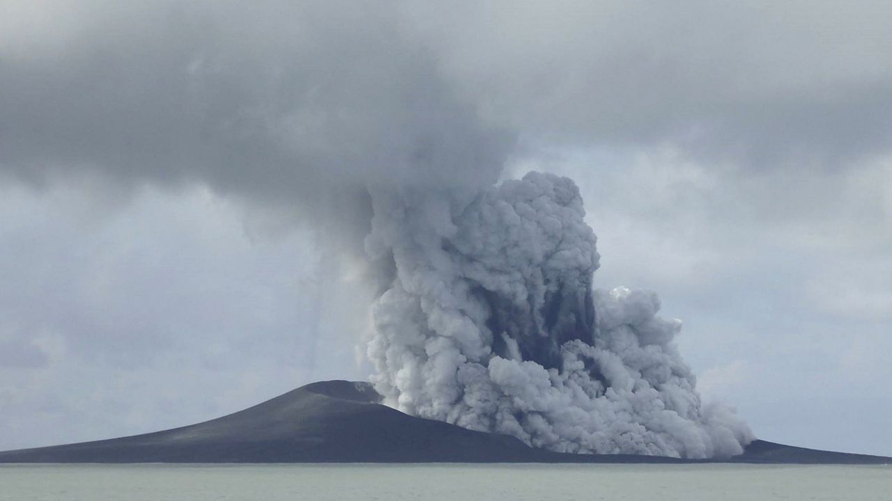 The Hunga Tonga-Hunga Ha’apai volcano erupts near Tonga in the South Pacific Ocean on Jan. 14, 2015. The volcano shot millions of tons of water vapor high up into the atmosphere according to a study published Thursday, Sept. 22, 2022, in the journal Science. (AP Photo/New Zealand's Ministry of Foreign Affairs and Trade)
