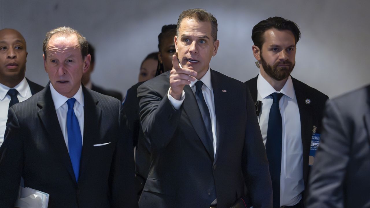 Hunter Biden, son of President Joe Biden, with attorney Abbe Lowell, left, leaves after a closed-door deposition in the Republican-led investigation into the Biden family, on Capitol Hill in Washington, Wednesday, Feb. 28, 2024. (AP Photo/J. Scott Applewhite)