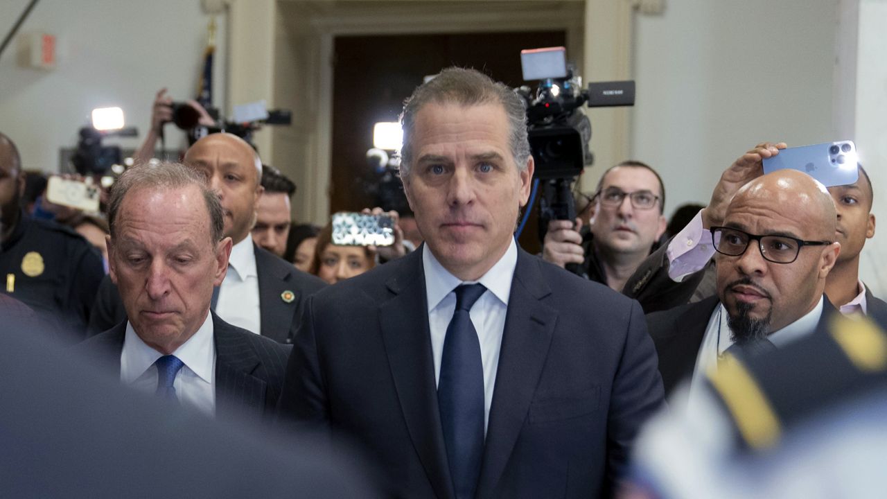 Hunter Biden, President Joe Biden's son, accompanied by his attorney Abbe Lowell, leaves a House Oversight Committee hearing as Republicans are taking the first step toward holding him in contempt of Congress, Wednesday, Jan. 10, 2024, on Capitol Hill in Washington. (AP Photo/Jose Luis Magana)