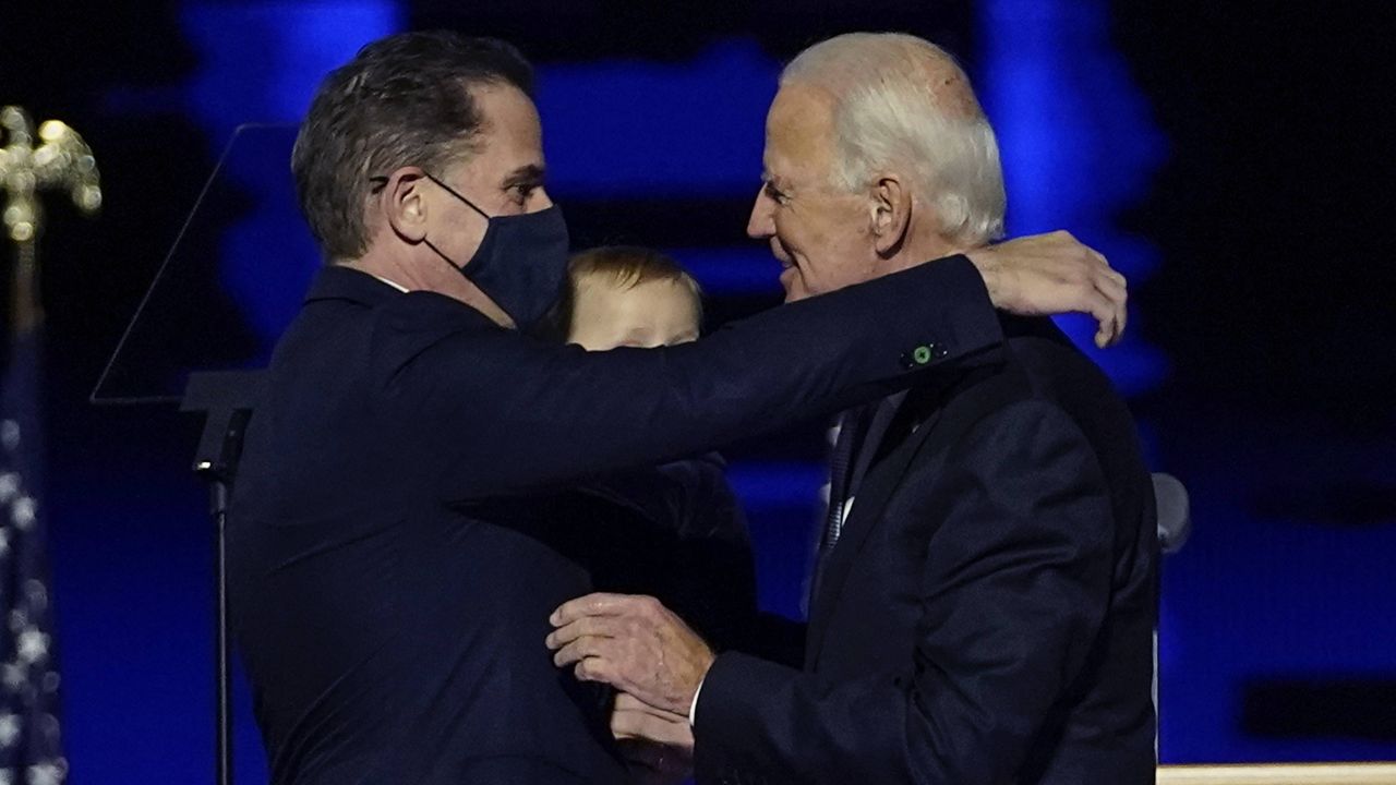 Joe Biden embraces his son Hunter Biden in Wilmington, Del., on Nov. 7, 2020. (AP Photo/Andrew Harnik, Pool)