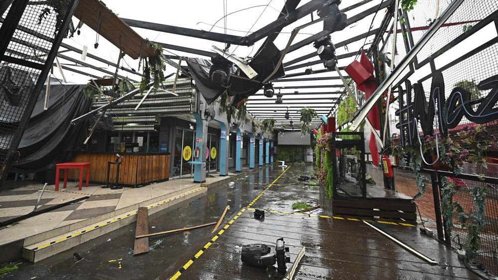 A commercial area is damaged after the passing of Hurricane Pamela in Mazatlan, Mexico, Wednesday, Oct. 13, 2021. Hurricane Pamela made landfall on Mexico's Pacific coast just north of Mazatlan on Wednesday, bringing high winds and rain to the port city. (AP Photo/Roberto Echeagaray)