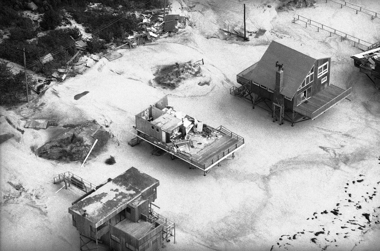 Roofs of houses in Fire Island, New York, were blown away by Hurricane Gloria as it swept through the area, Sept. 28, 1985. (AP Photo/Rick Maiman)