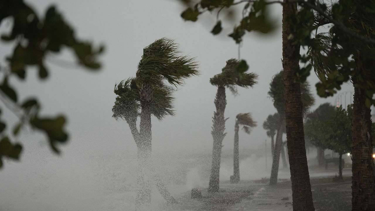 Waves crash on the shoreline along the Jensen Beach Causeway, as conditions deteriorate with the approach of Hurricane Nicole, Wednesday, Nov. 9, 2022, in Jensen Beach, Fla. (AP Photo/Rebecca Blackwell)