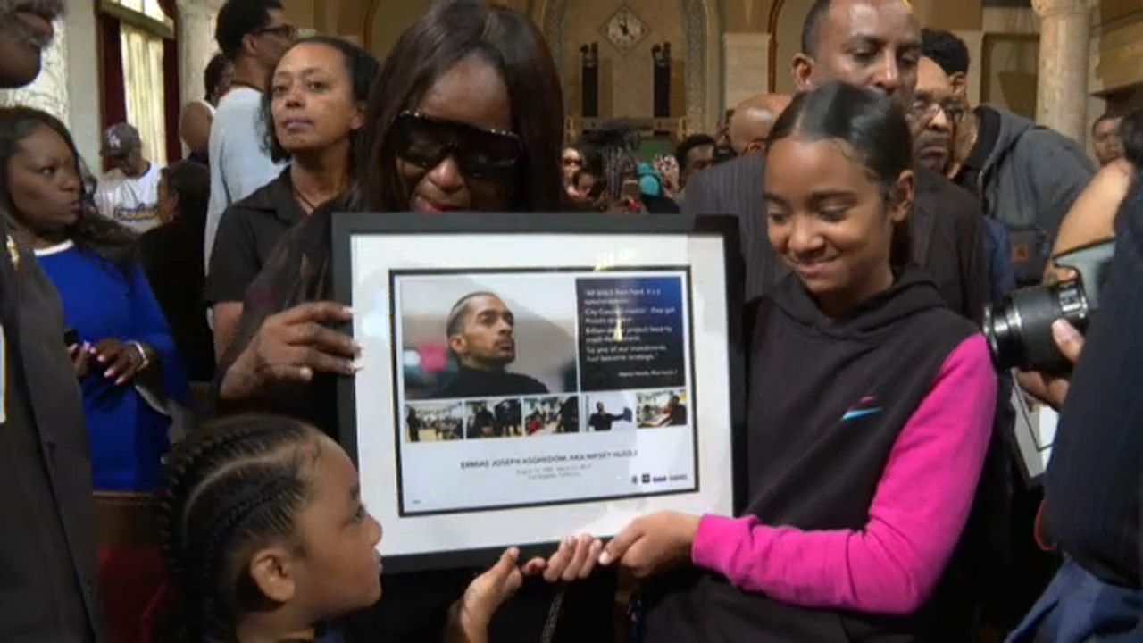 Nipsey Hussle's Hollywood Hills Gravesite Flooded with Flowers