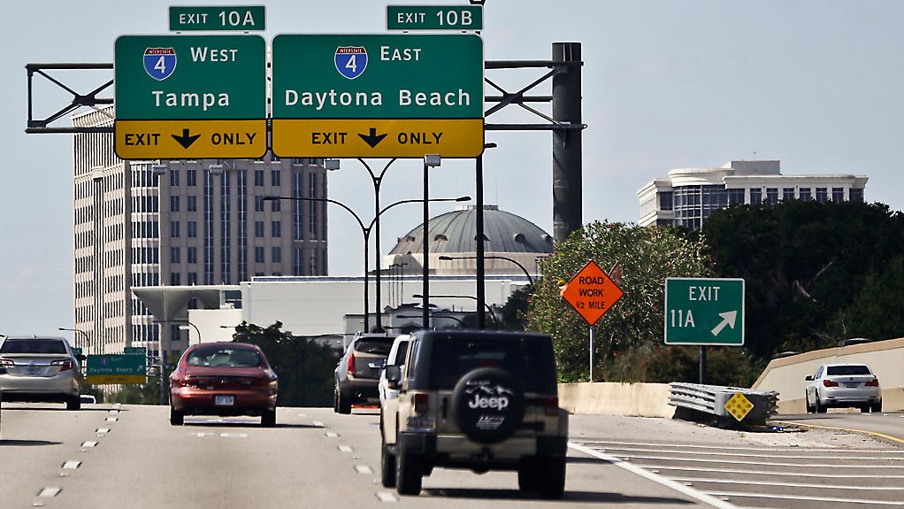 Signs in Orlando, Fla., direct motorists to Tampa and Daytona Beach, the Intestate 4 corridor. (AP Photo/John Raoux)