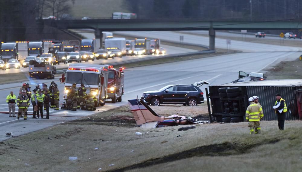 Plane crashes into tractortrailer on North Carolina highway