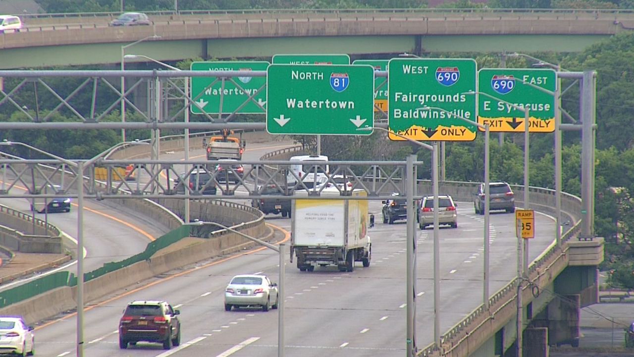 i-81 viaduct in syracuse with cars driving along it