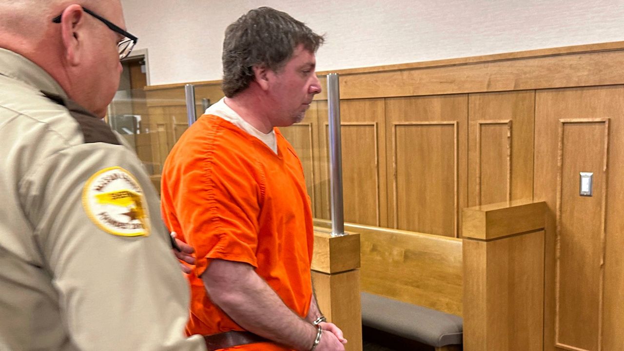 Deputies lead Ian Cramer, center, out of a courtroom at the Mercer County Courthouse in Stanton, N.D., on Monday, Dec. 30, 2024, after his sentencing. (AP Photo/Jack Dura)