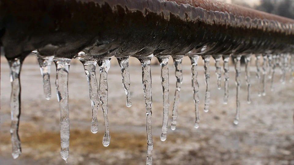Ice is formed on a pipe in this stock image. (Pixabay)