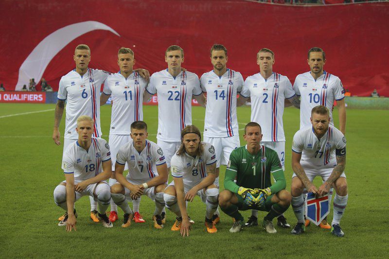 FILE - In this Friday, Oct. 6, 2017 filer players of Iceland’s national squad pose for photographs prior to the World Cup Group I qualifying soccer match between Turkey and Iceland in Eskisehir, Turkey. (AP Photo, File)