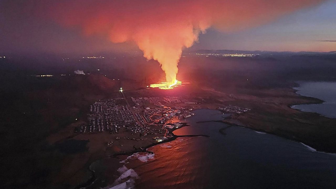 In this photo provided by Civil Protection taken from the Icelandic Coast Guard's helicopter, a view of lava as the volcano erupts near Grindavík, Iceland, Sunday, Jan. 14. 2024. (Icelandic Civil Protection via AP)