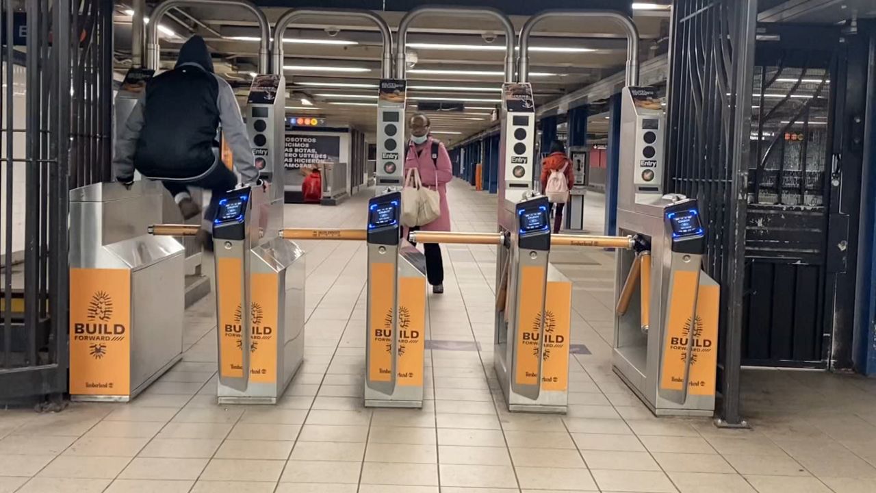 Subway turnstiles are pictured.