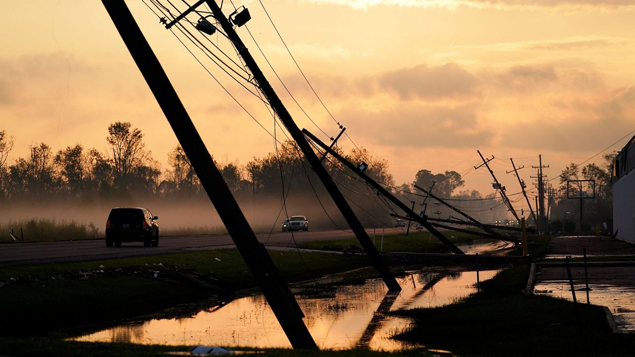 Downed power lines slump over a road in the aftermath of Hurricane Ida in Reserve, La. (AP/Matt Slocum)