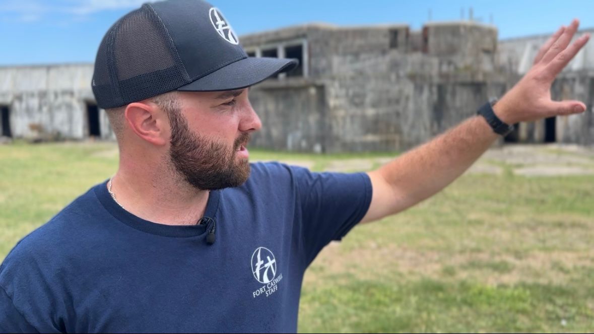 Hastin McGill points out where the citadel used to stand in the middle of the fort. (Spectrum News 1/Rachel Boyd)