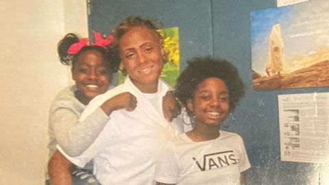 Nadia Kerr, center, poses with her daughters Aaryn, left, and Meghan, right, during one of their visits to a Texas prison in Gatesville. Girls Embracing Mothers, a Dallas-based nonprofit, works with families like the Kerrs to help build and nurture the mother-daughter bond during incarceration. (Photo provided by Nadia Kerr.)