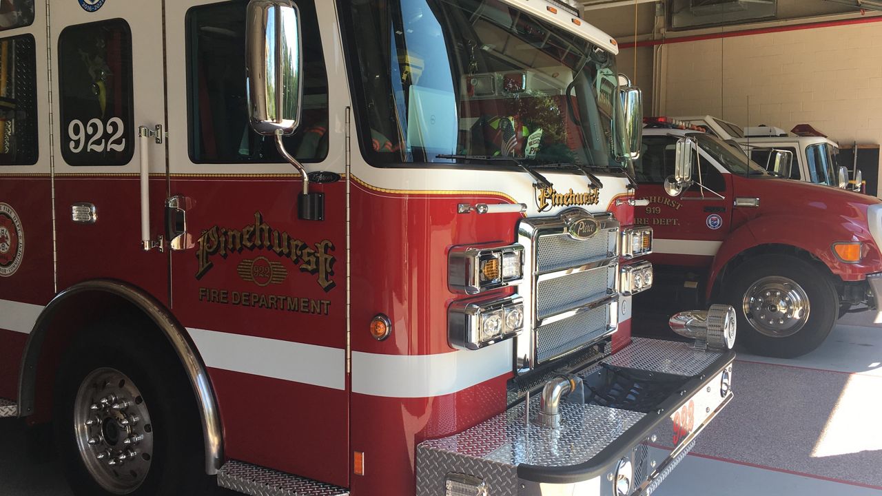 Pinehurst Firefighters have trucks lined up in case of an emergency at their fire station.