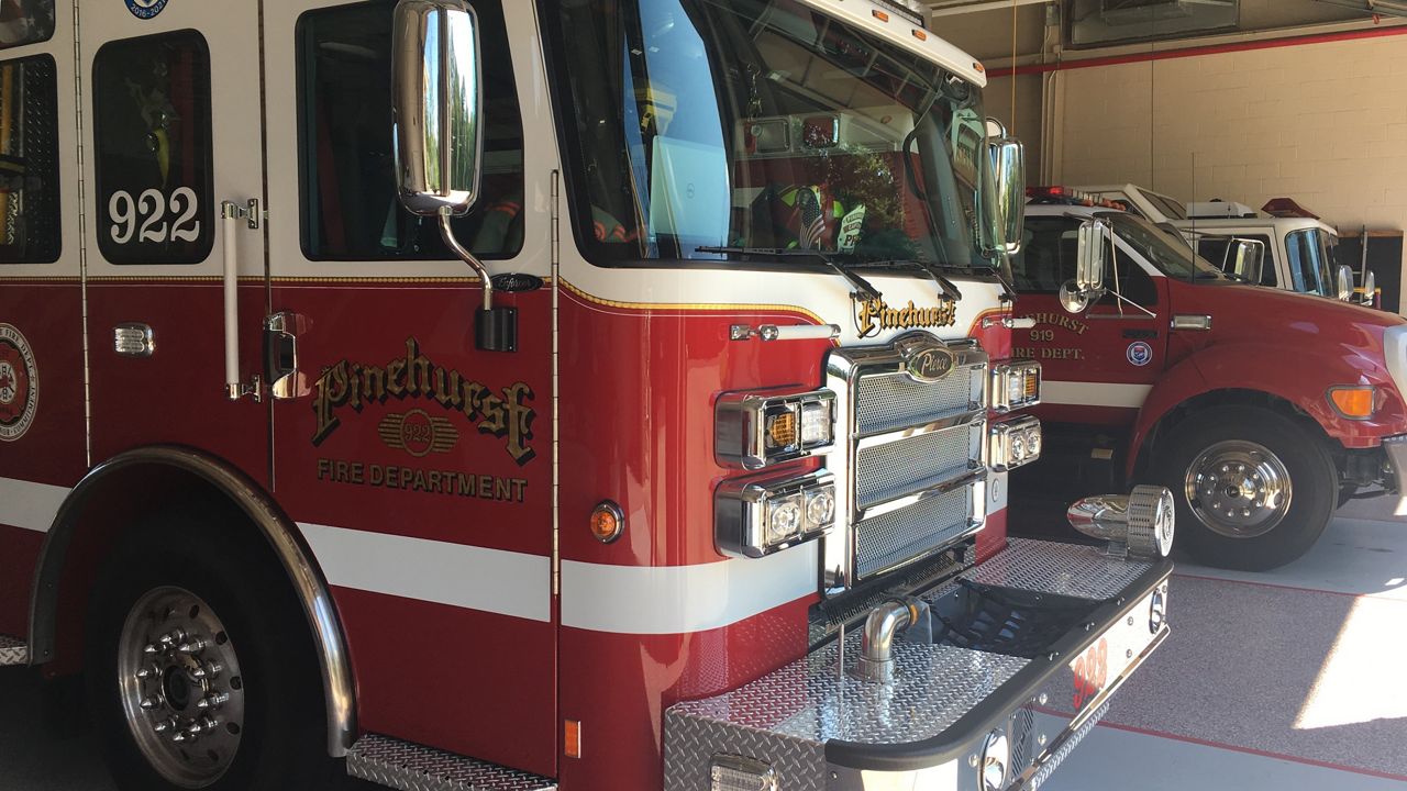 Pinehurst Firefighters have trucks lined up in case of an emergency at their fire station.