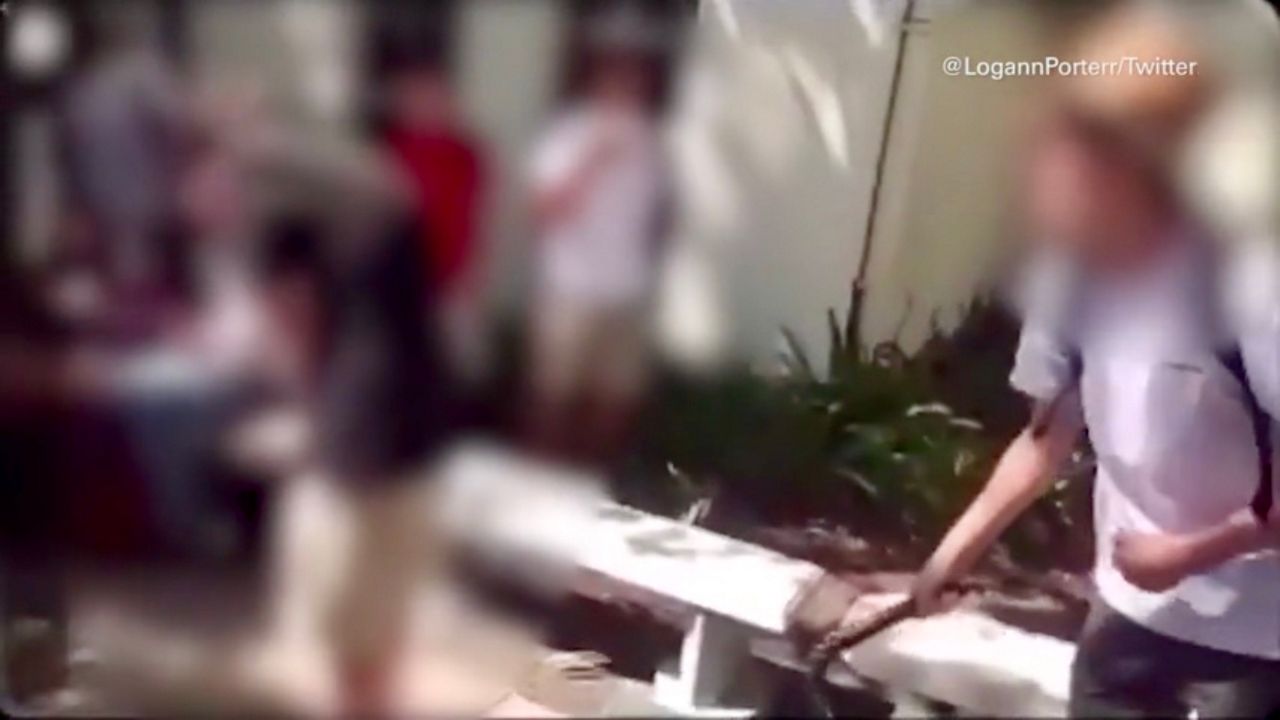 A student from another school posted a video of this student from St. Pete High dressed as a slave owner and carrying a whip.