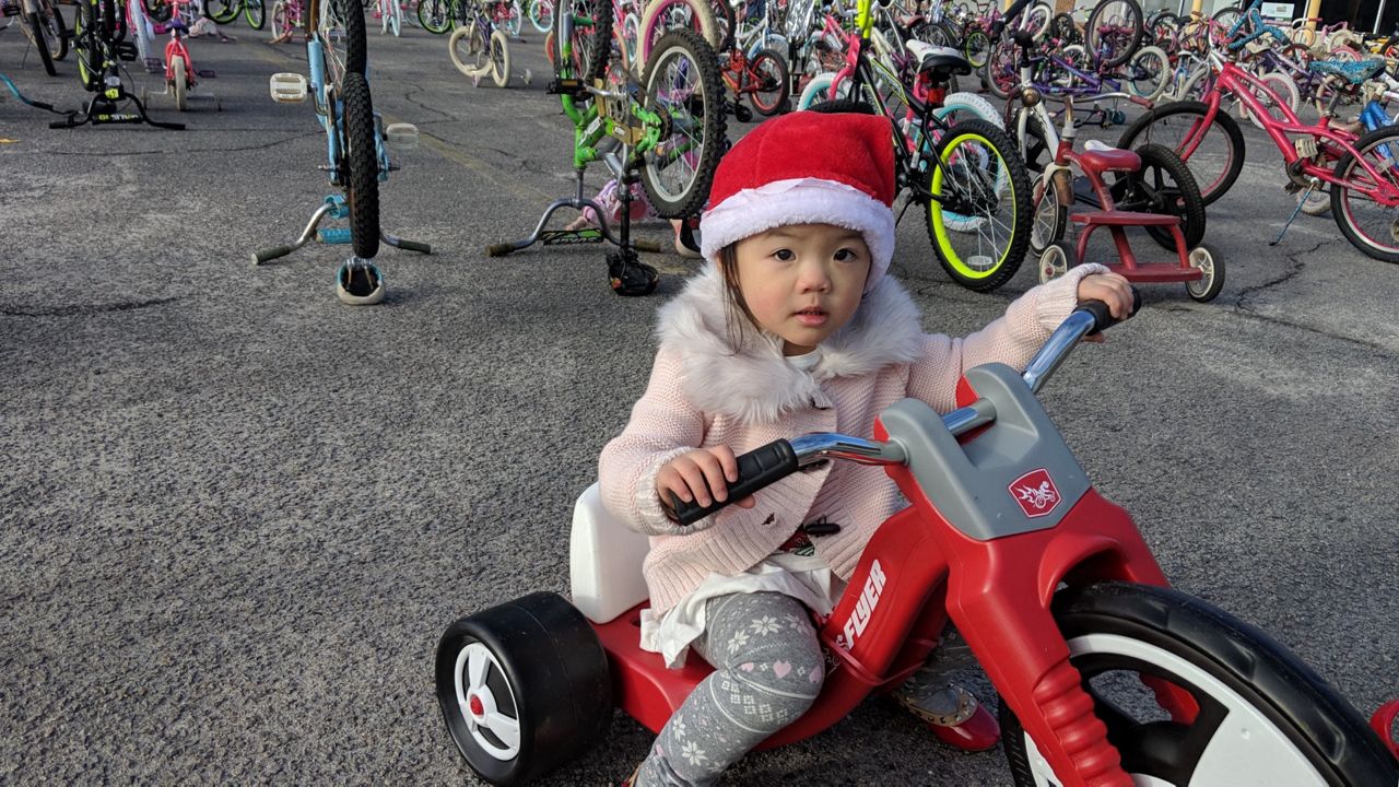 Hundreds of Kids Receive Bikes on Christmas