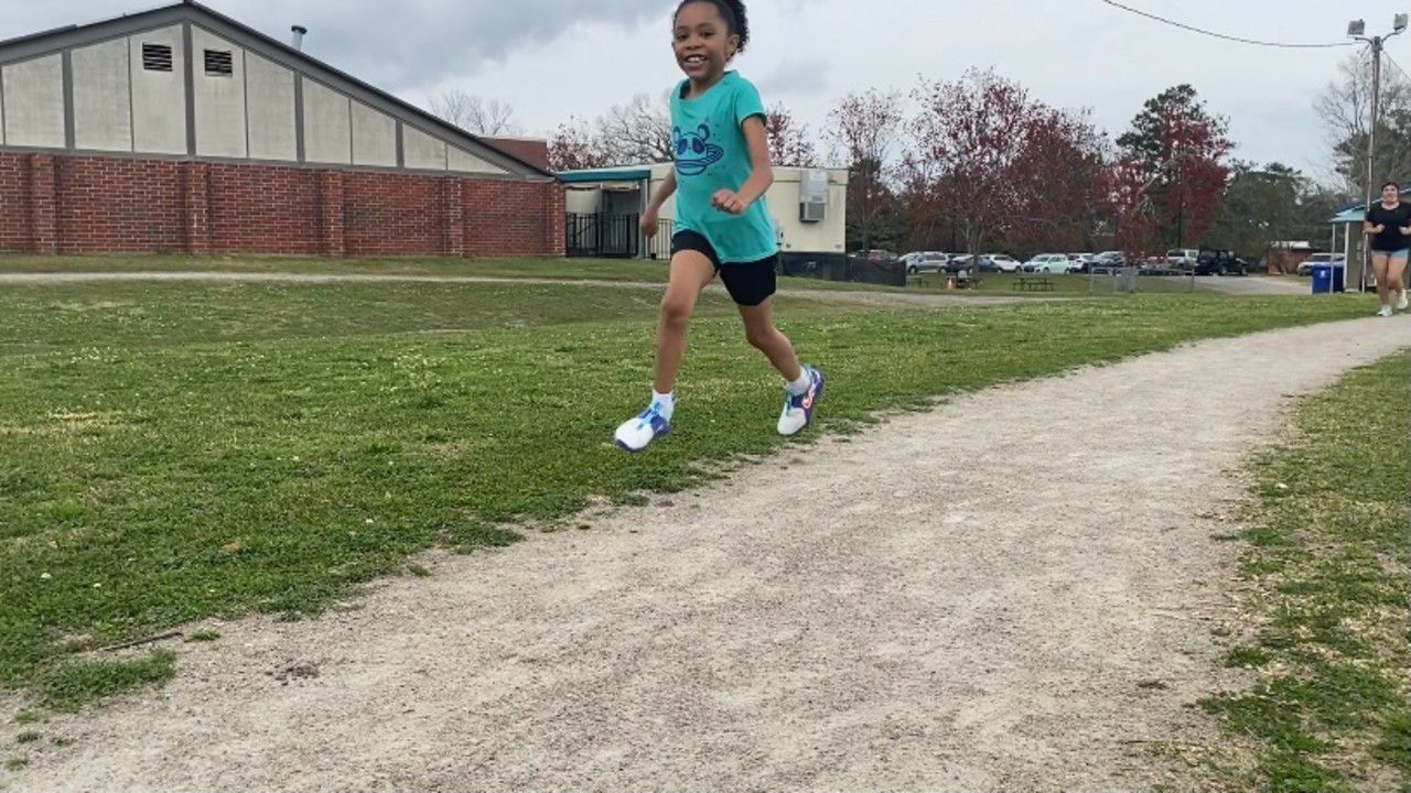 image of girl running