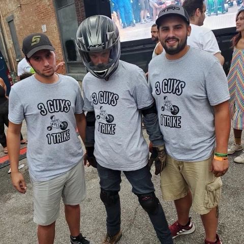 Jared Fox (middle) poses with his brothers during Danger Wheel. The three brothers are part of a racing team during the event. (Photo courtesy of Jared Fox)