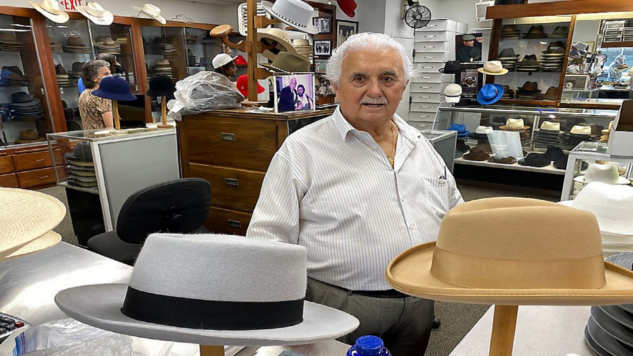 Batsakes Hat Shop owner outfits music festival attendees