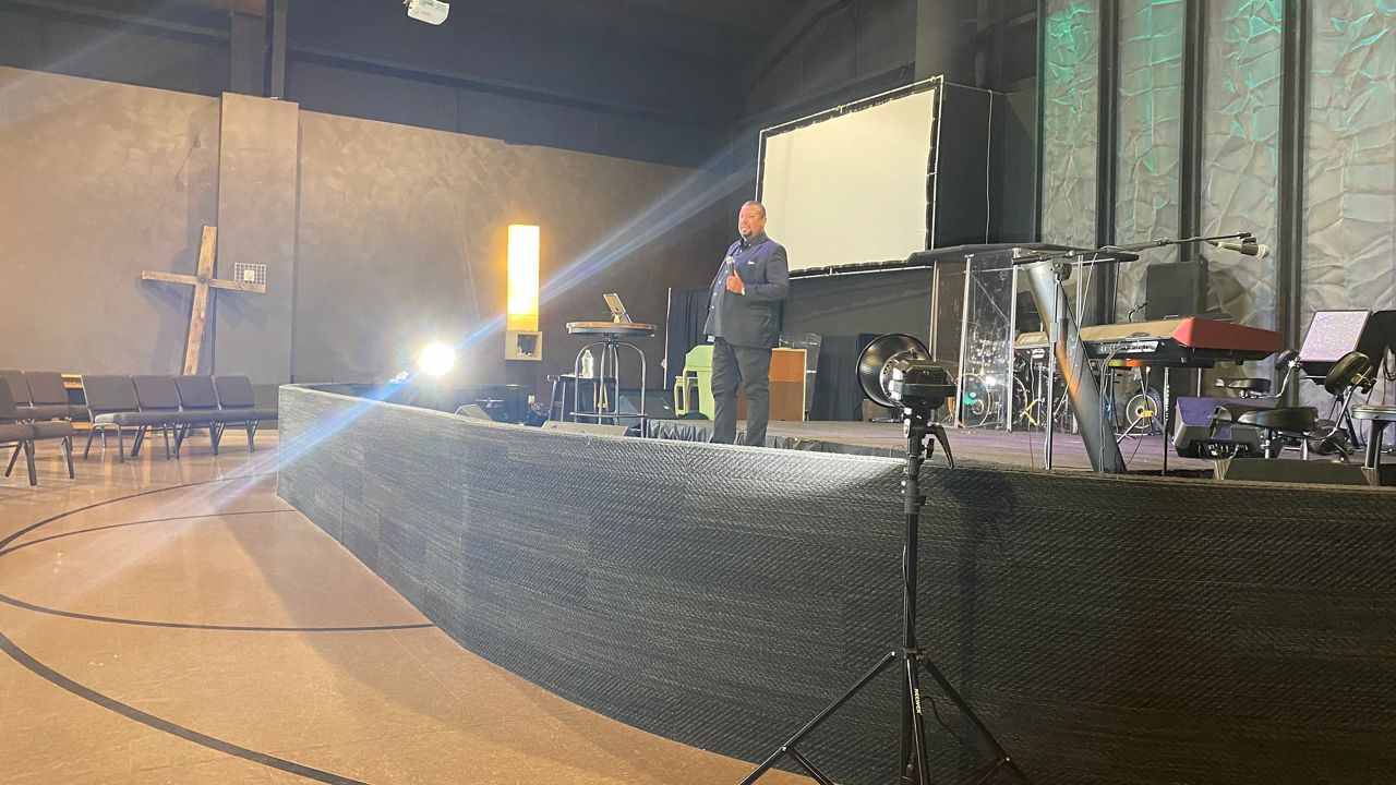 Pastor Barrett Berry records service for Empowered Living Church online