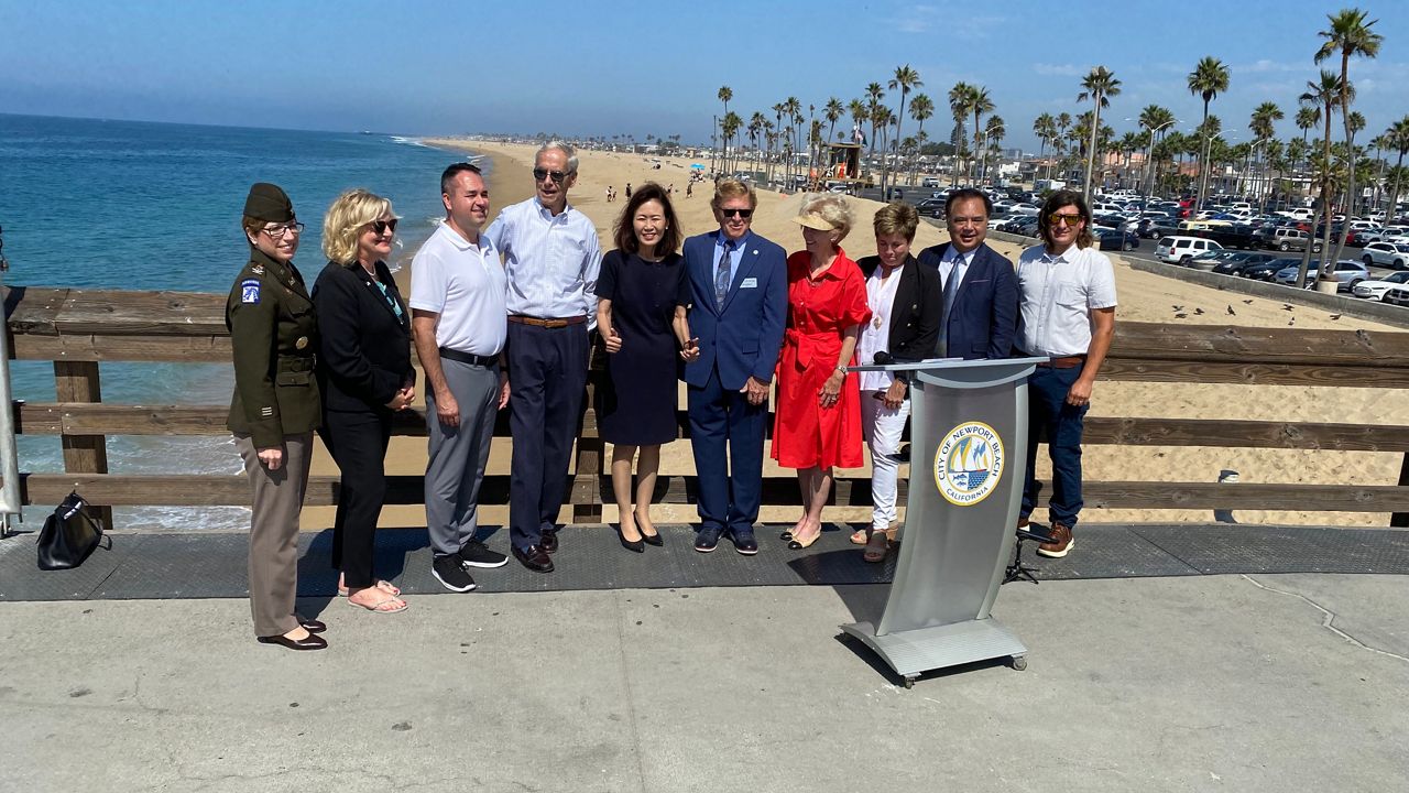 Local politicians gathered to announce $15.5 million in federal spending for sand replenishment of coastal beaches in cities like Seal Beach, Newport Beach and Huntington Beach. (Spectrum News/William D'Urso)