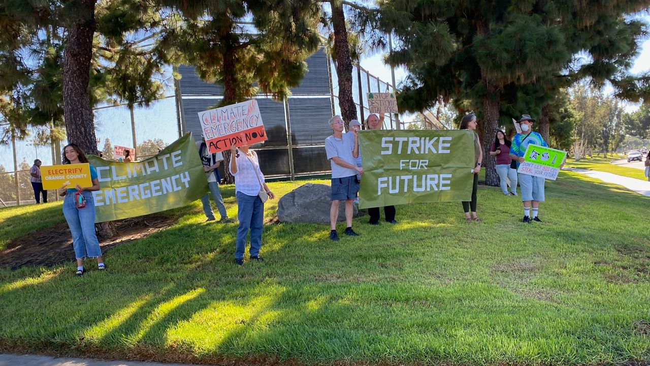 Protesters in Irvine want the city to hire staff dedicated to climate change. (Spectrum News/William D'Urso)