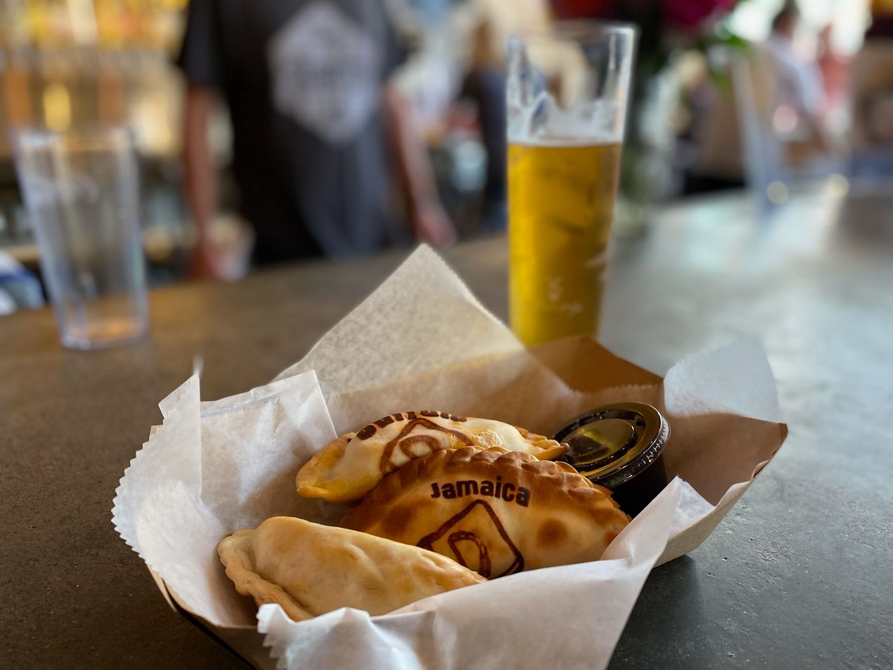 The Empanada's Box serves food at Braxton Brewing Co.'s taproom in Covington. The Empanada's Box has a brick-and-mortar store nearby. (Casey Weldon/Spectrum News 1)