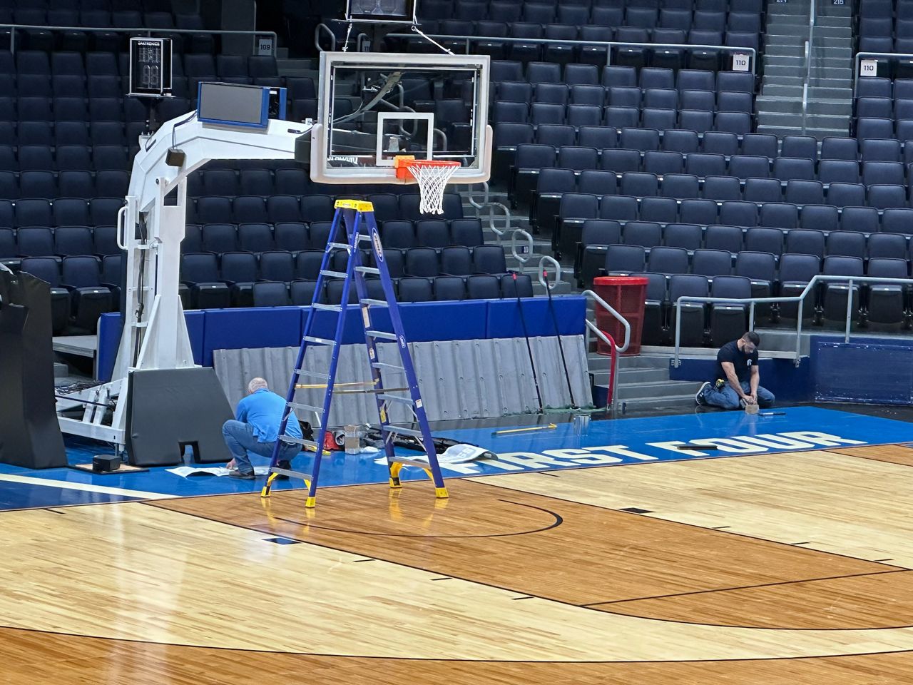 A team of about 100 people worked Sunday to transform UD Arena into the site of the First Four round of the NCAA Tournament. Work included replacing the floor and adding NCAA signage throughout the arena. (Michelle Alfini/Spectrum News 1)