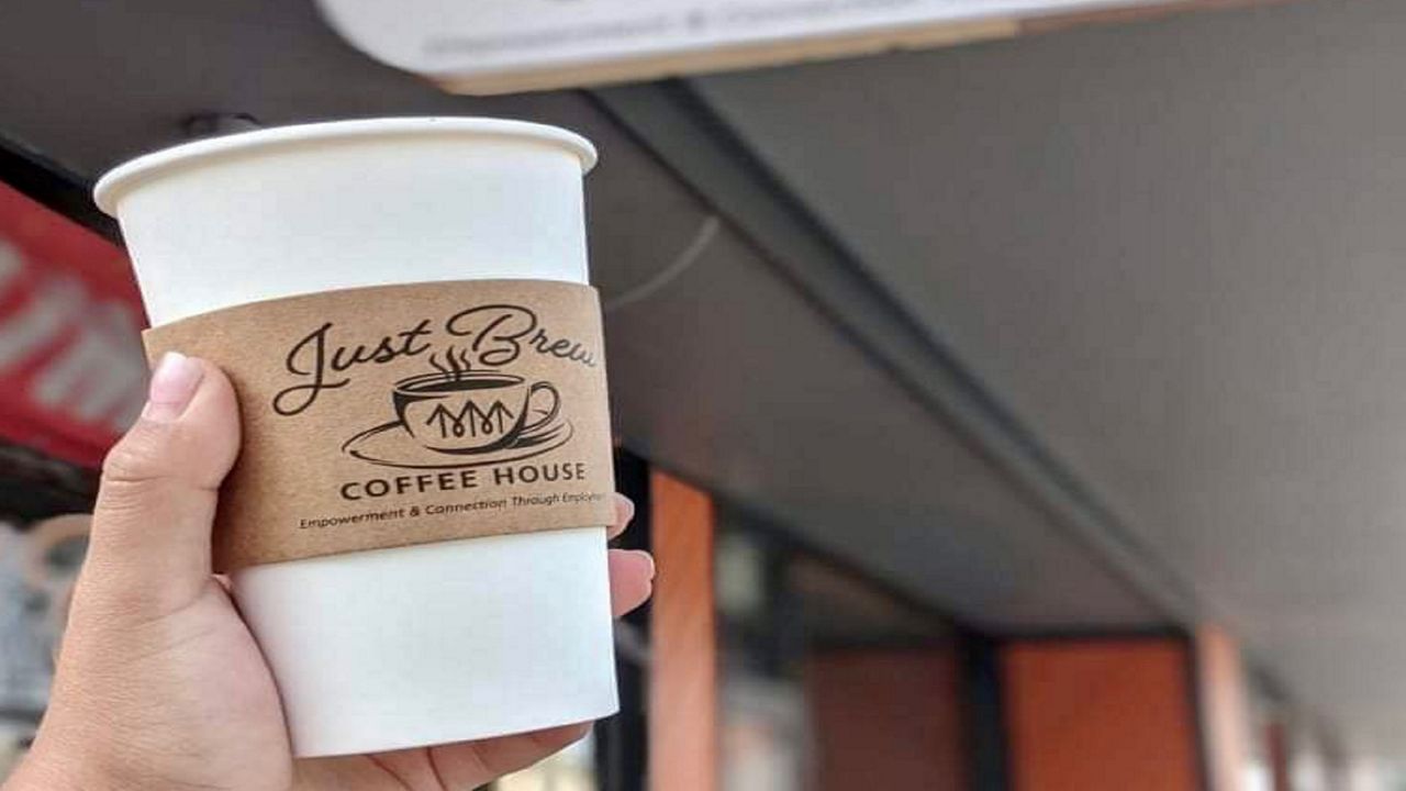 A photo of a coffee cup at Just Brew Coffee.