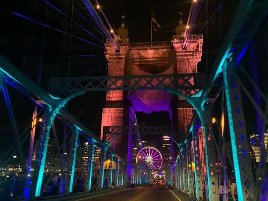 The Roebling Suspension Bridge lit up during BLINK 2019. Organizers didn't allow vehicles to use the bridge during the event. (Casey Weldon/Spectrum News 1)