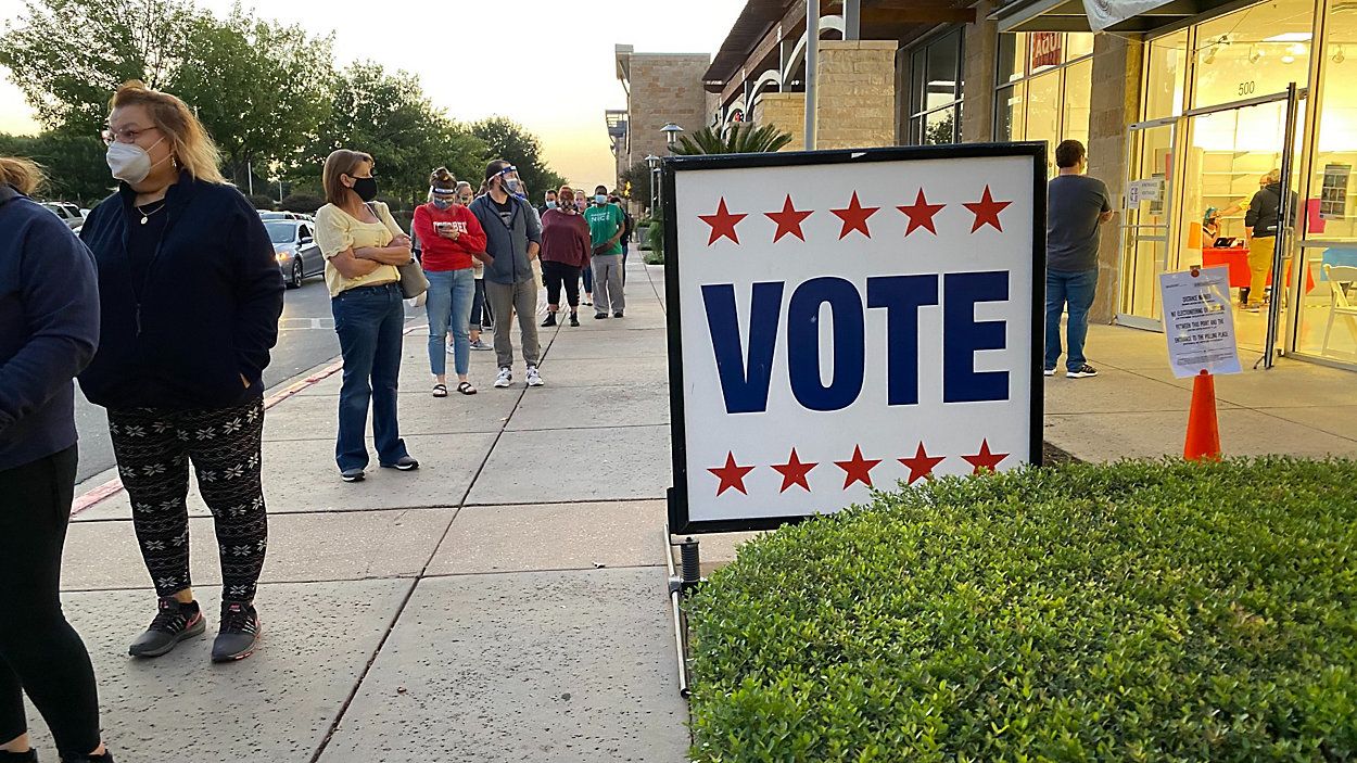People stand in line at an early voting location in Austin, Texas, in this image from October 13, 2020. (Spectrum News 1/Reena Diamante)
