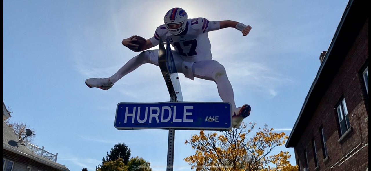 Stampede Stories: Bills fan behind Hurdle Avenue sign