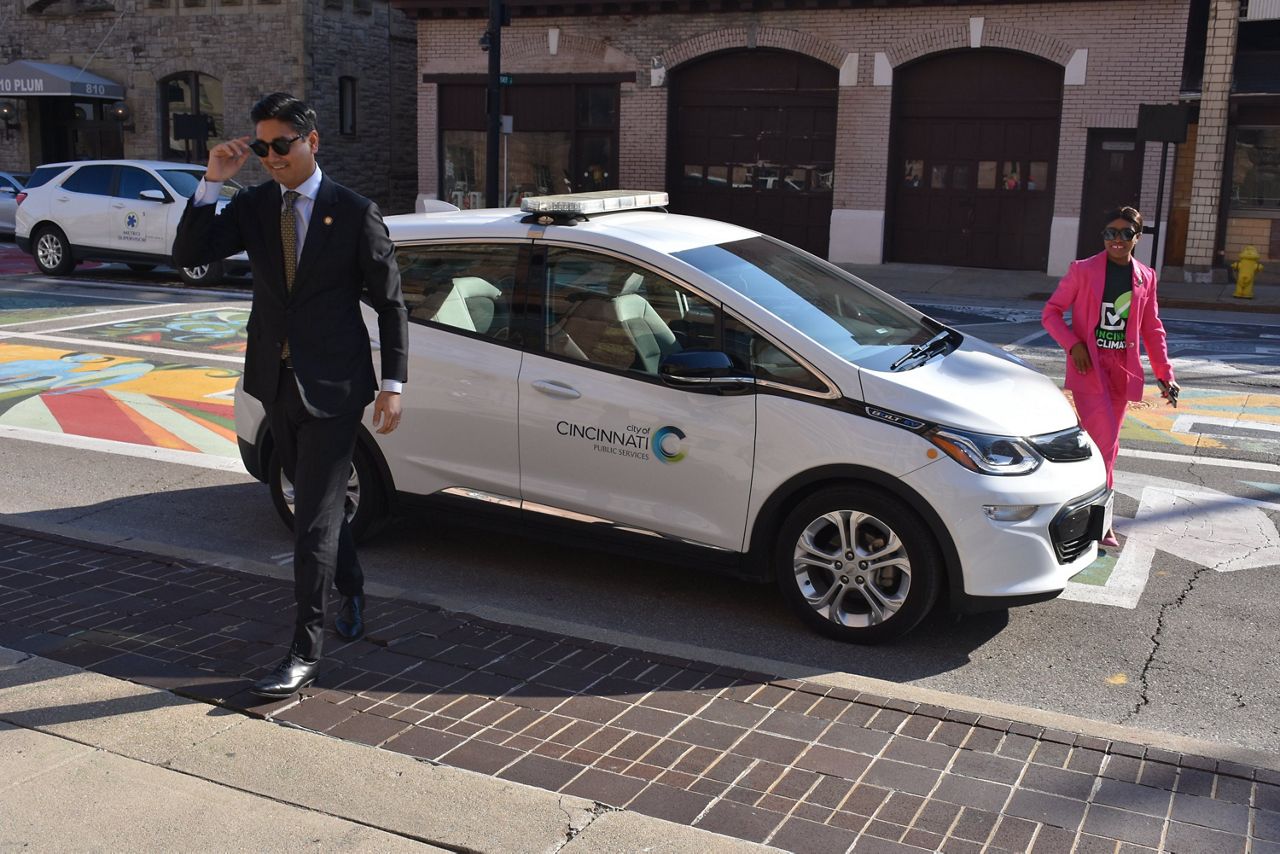 Mayor Aftab Pureval and City Council member Meeka Owens arrive at City Hall in one of the City of Cincinnati's all-electric vehicles. Pureval and Owens were there to announce the kick off of the Green Cincinnati Plan update process. (Casey Weldon/Spectrum News 1)