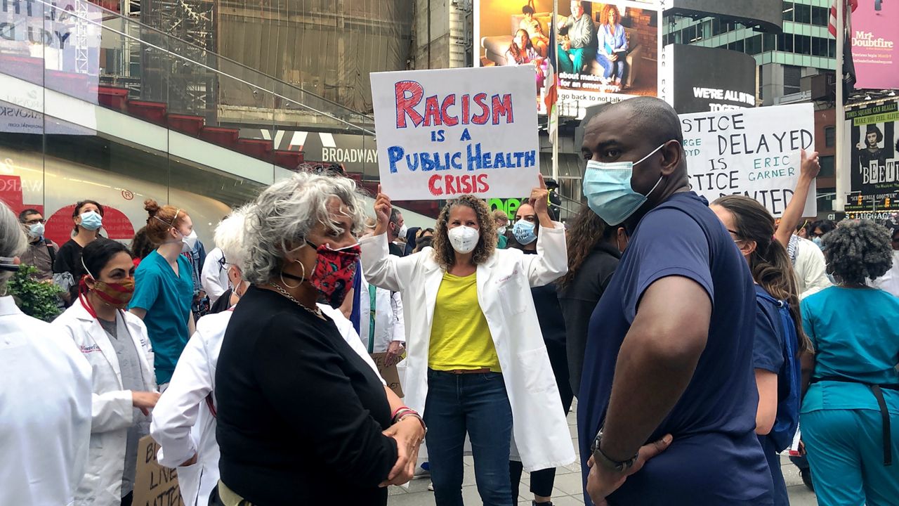Health care workers in Times Square 