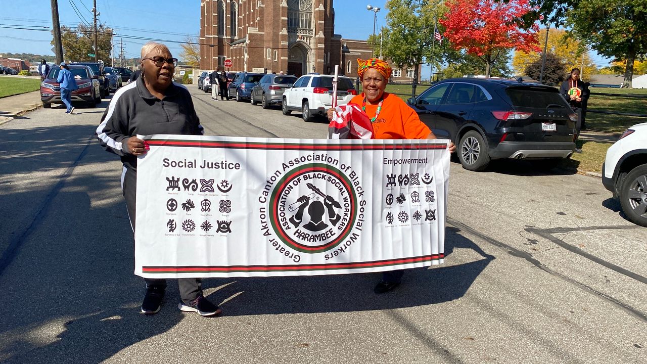 Protesters march through downtown Akron