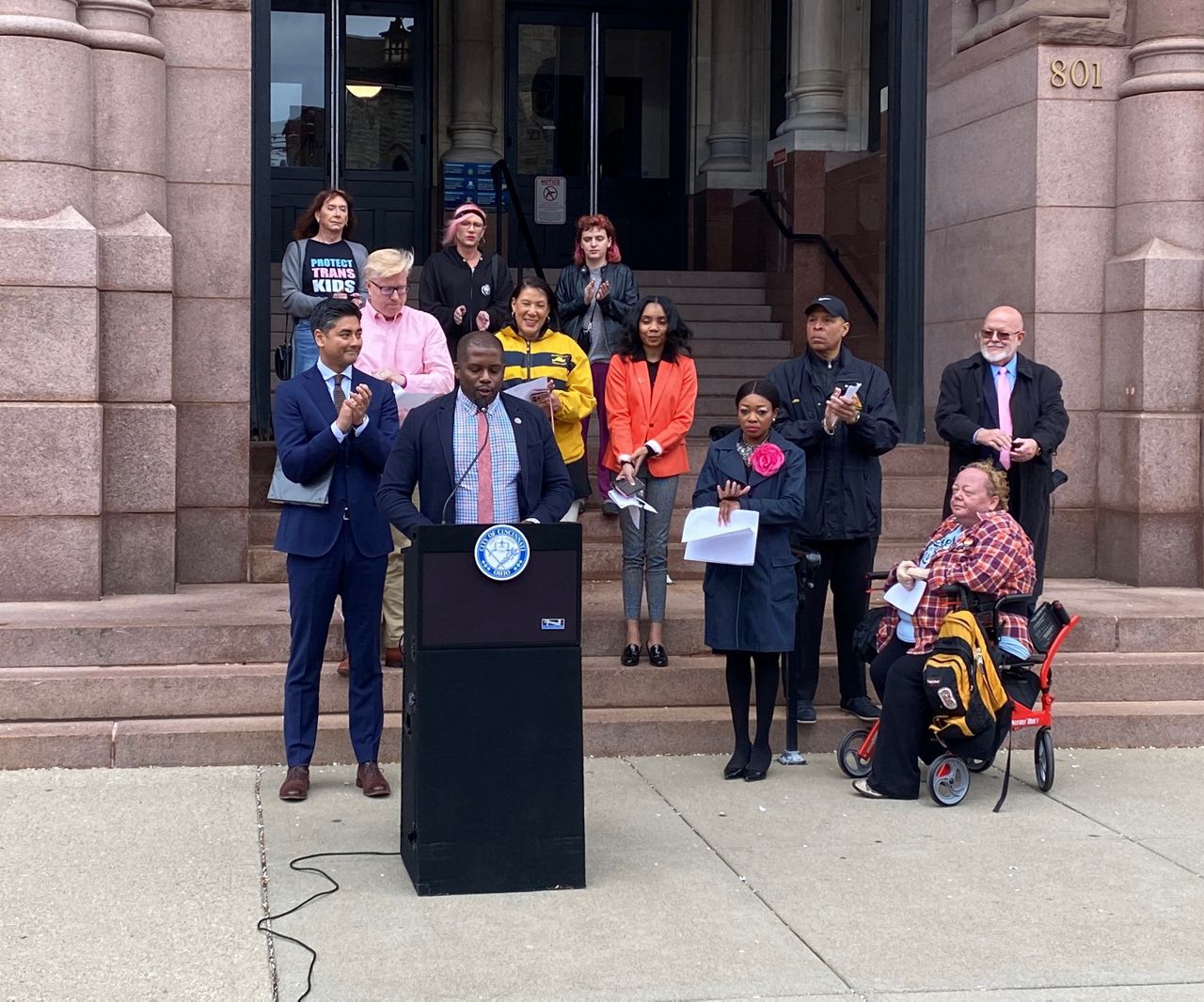 Council member Reggie Harris joins of group of advocates to raise a trans pride flag at Cincinnati City Hall. (Casey Weldon/Spectrum News 1)