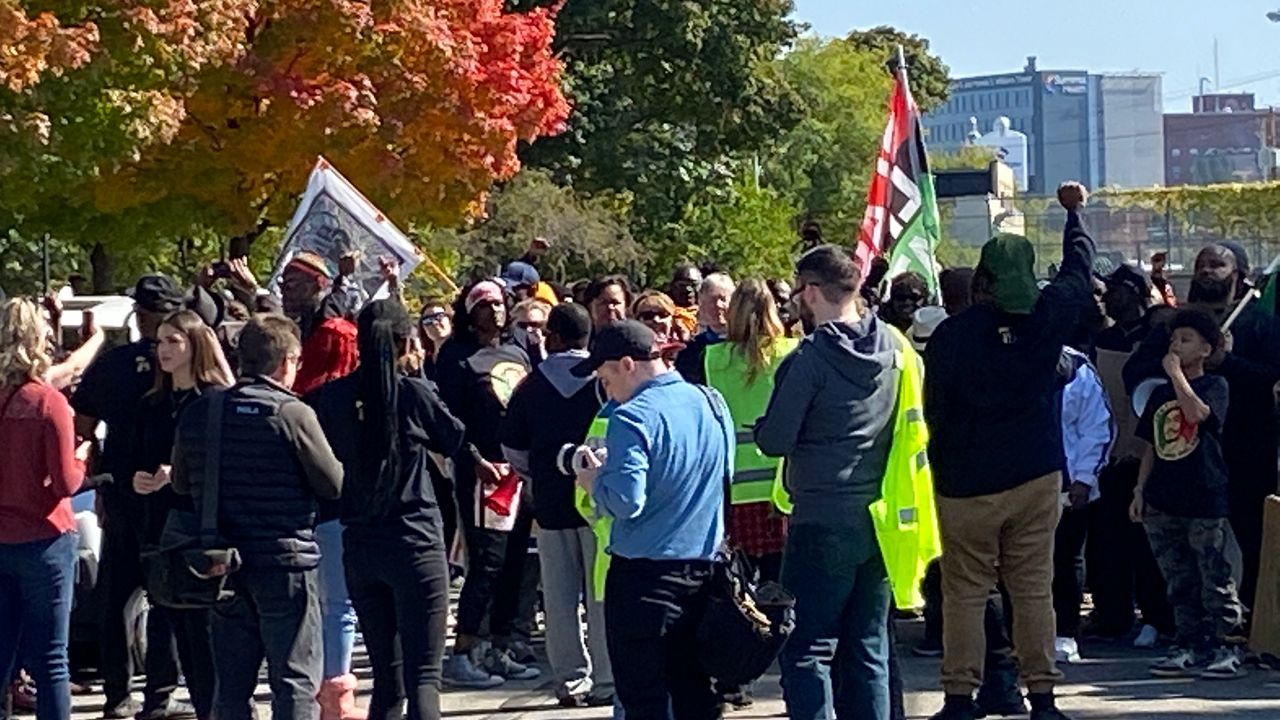 Protesters march through downtown Akron