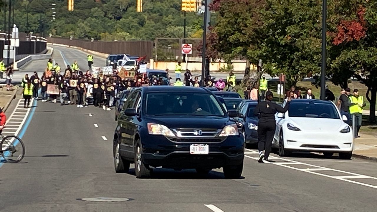 Protesters march through downtown Akron