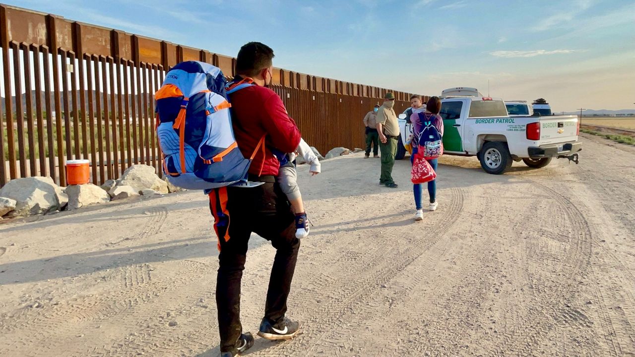 Spectrum News encounters migrants crossing the border