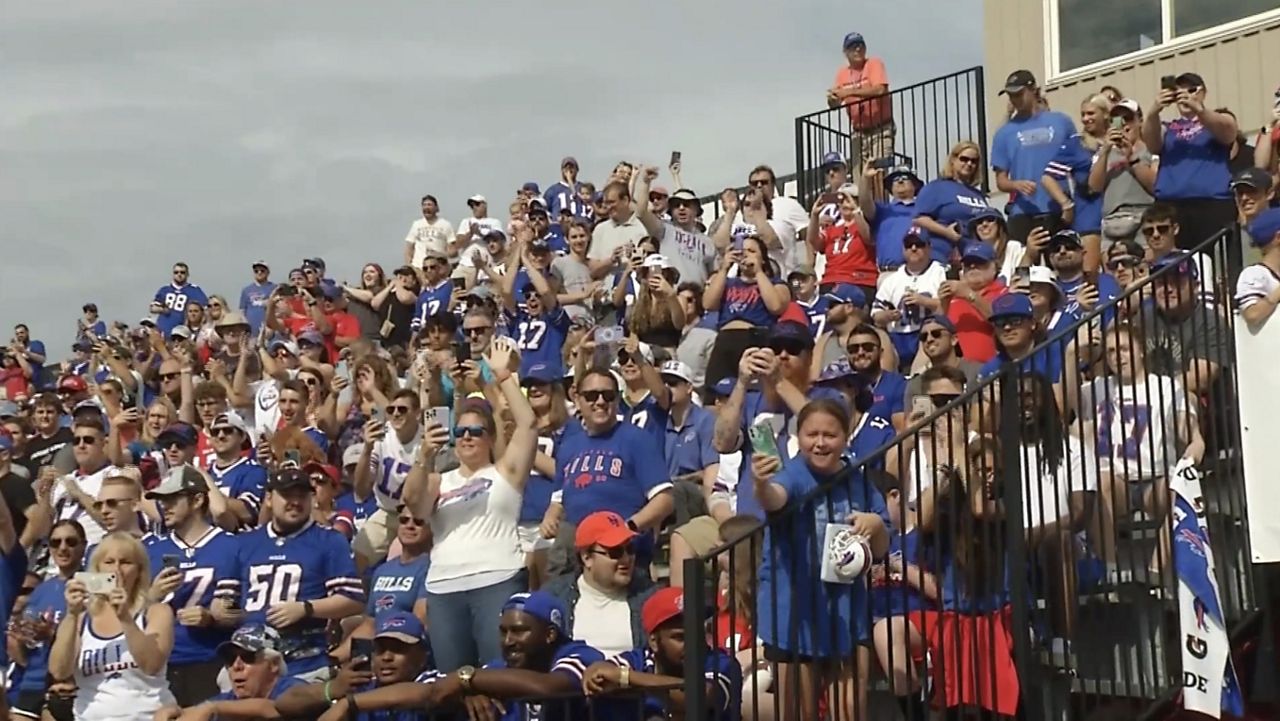 Local Buffalo Bills fans cheer on their team during the AFC