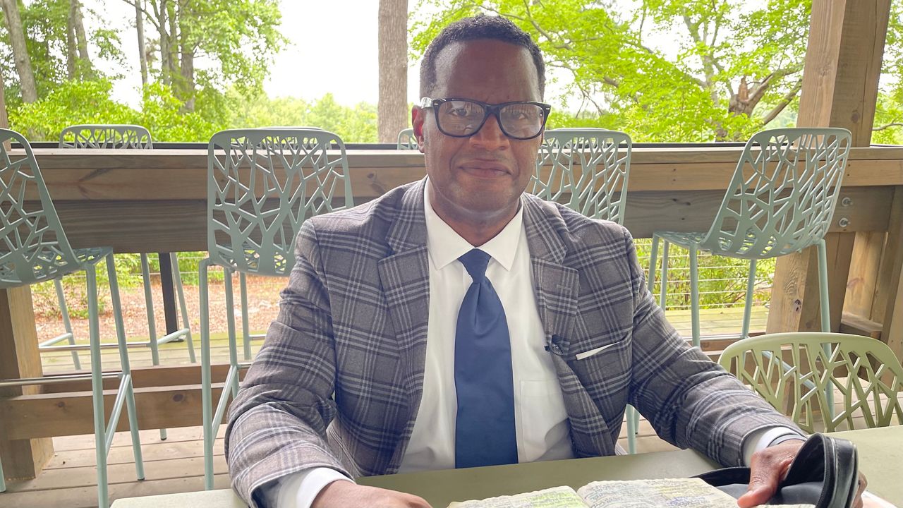 Pastor reading Bible